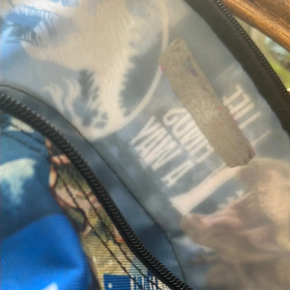 Jurassic World  life finds away backpack Print Backpack with Blue Accents